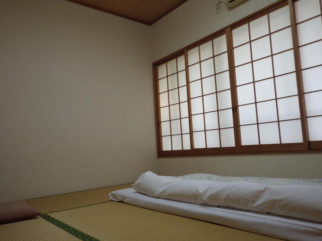 Uokagi Ryokan Nagoya Buitenkant foto
