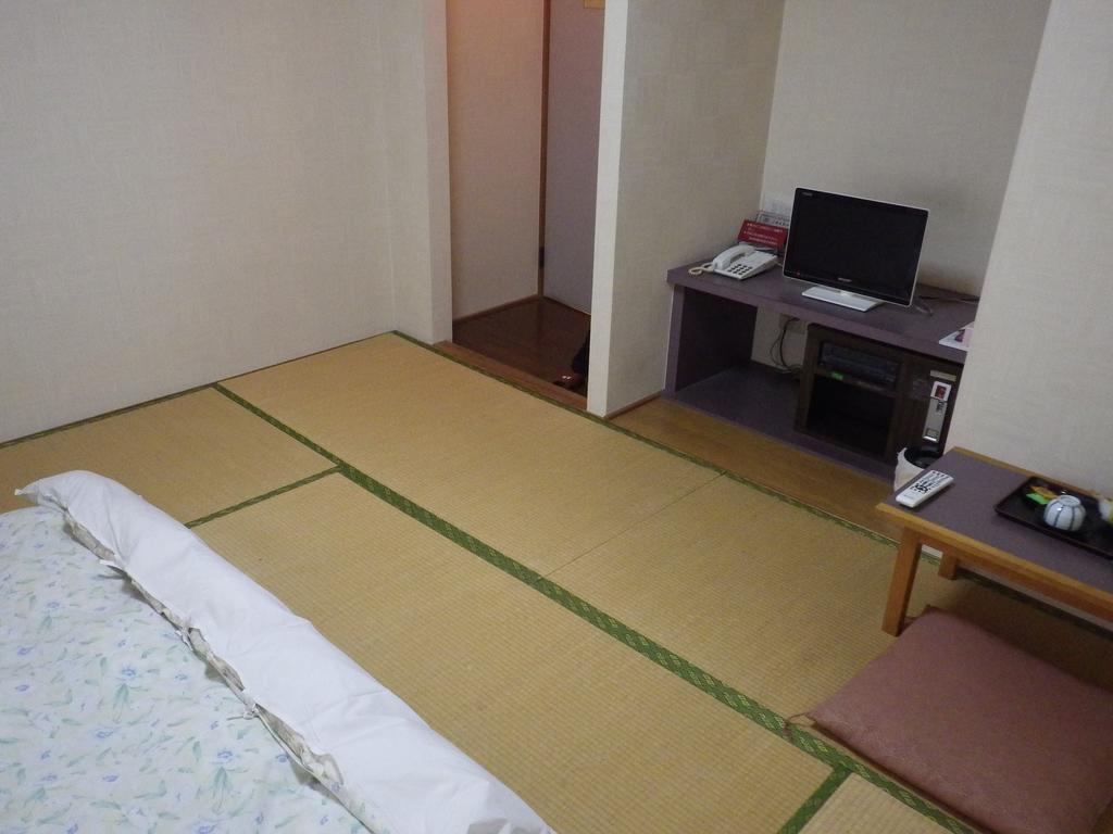 Uokagi Ryokan Nagoya Buitenkant foto