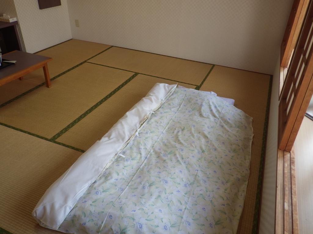 Uokagi Ryokan Nagoya Buitenkant foto